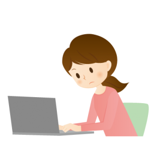 パソコンで調べる女性